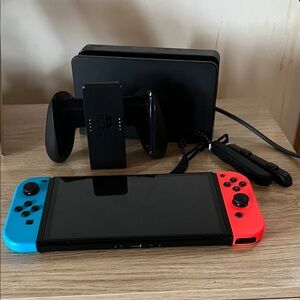 Nintendo Switch with Neon Blue and Red Joy-Con